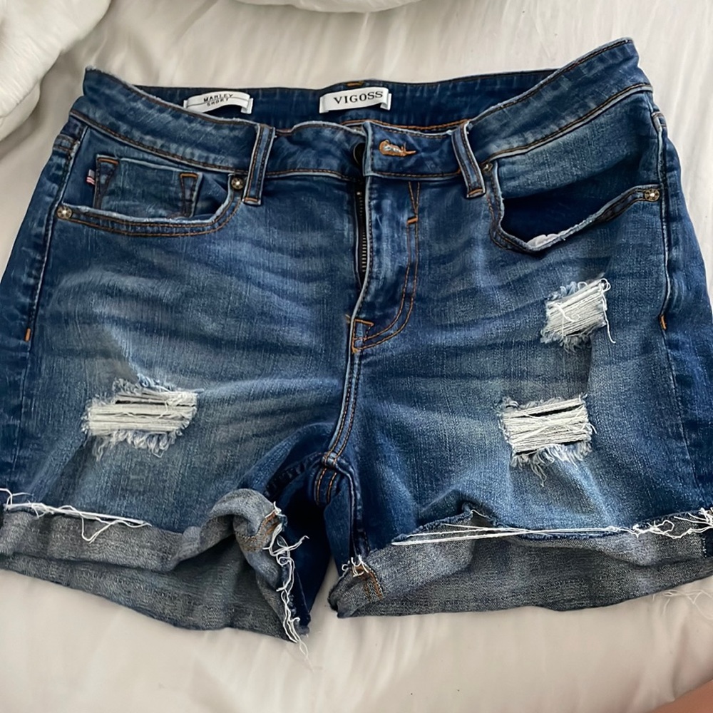 Mid rise cuff distressed shorts